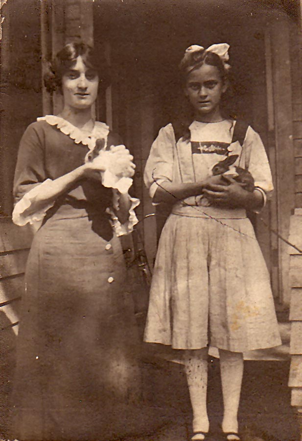 eliz and sister with rabbits